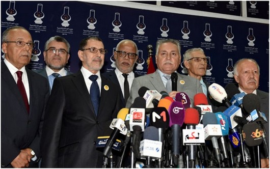 العثماني رئيس الحكومة مع زعماء أحزاب الأغلبية