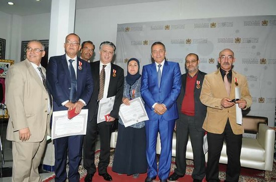 الدكتور مصطفى بزاري مع مسؤولين مغاربة يتوسطهم الوزير العلمي