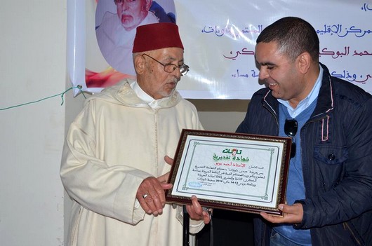 الشيخ بونو والصحافي جواد إتويول رئيس مصلحة الأانشطة الملكية والأميرية بوكالة المغرب العربي للأنباء