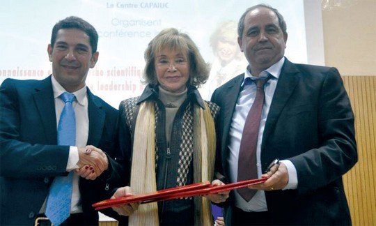 عز الدين الميداوي والويز أمزازي تتوسطهما مسٍؤولة إسبانية